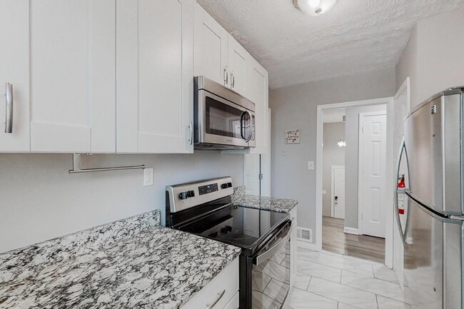 Photo - The Big Valley | Stone Mountain house with dining area featuring a modern, high-quality design pe...