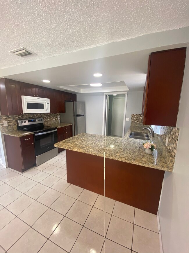 12703 Alida Pl