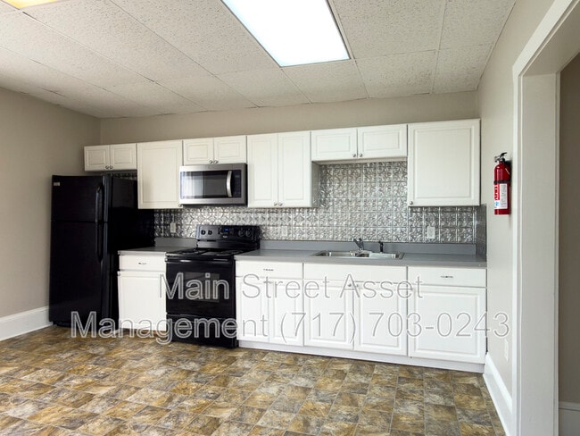 Building Photo - 100 S Front St Unit Apt 1