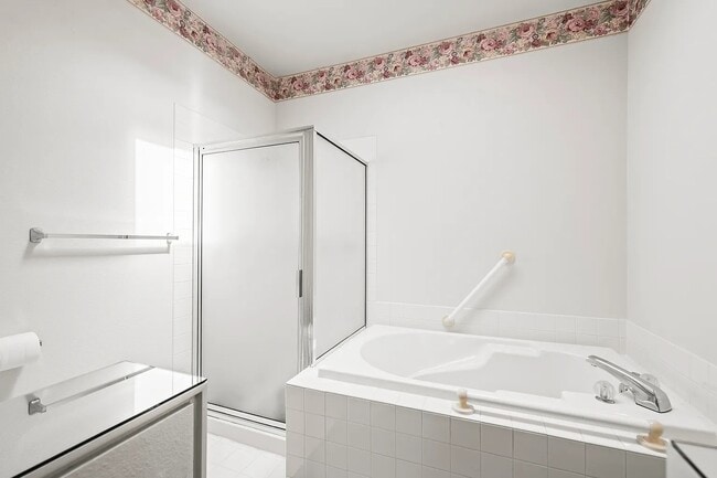 Photo - 7104 88th Avenue Ct SW Unit Chambers Gardens Condo