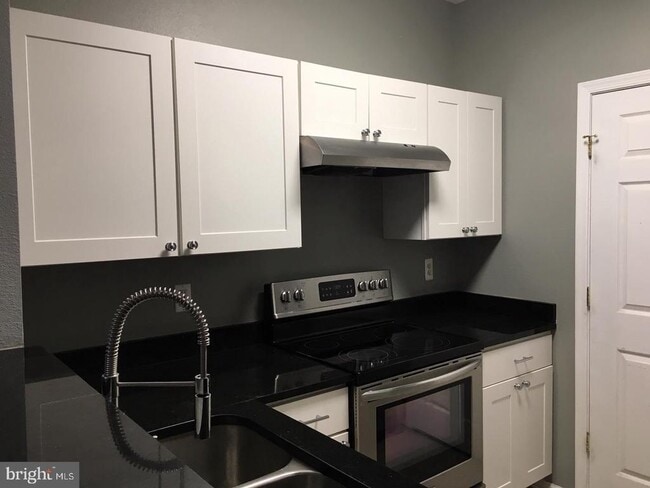 Building Photo - 1521 Spring Gate Dr. Unit 10202