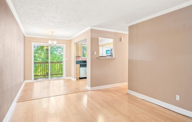 Photo - Spacious 2-Bedroom Condo with Forest Views, Private Balcony, In-Unit Laundry & Community Amenitie...