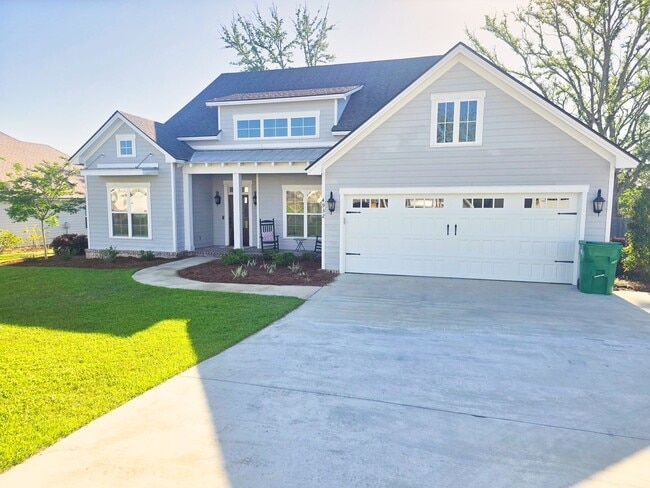 Photo - Spacious 4BR/3BA Home with Open Floor Plan, Screened Porch & Fenced Backyard