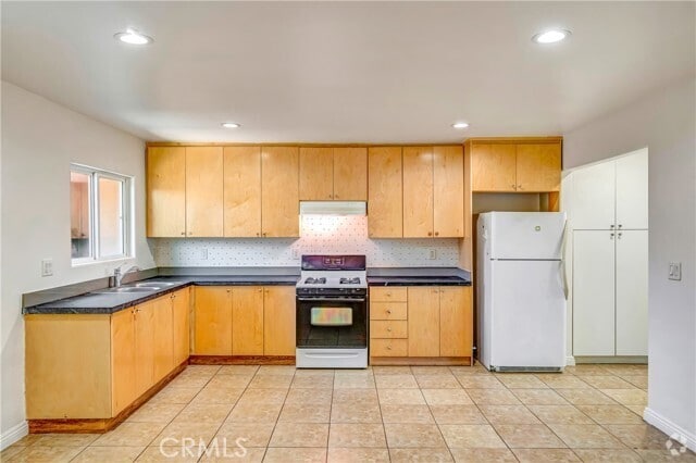 Building Photo - 6735 Elmer Ave Unit 12 Rental