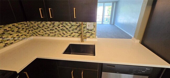 1201 NE 191st St Unit G306