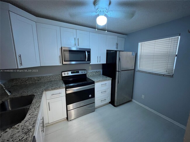 Photo - 7260 Woodmont Ter Condo Unit 102