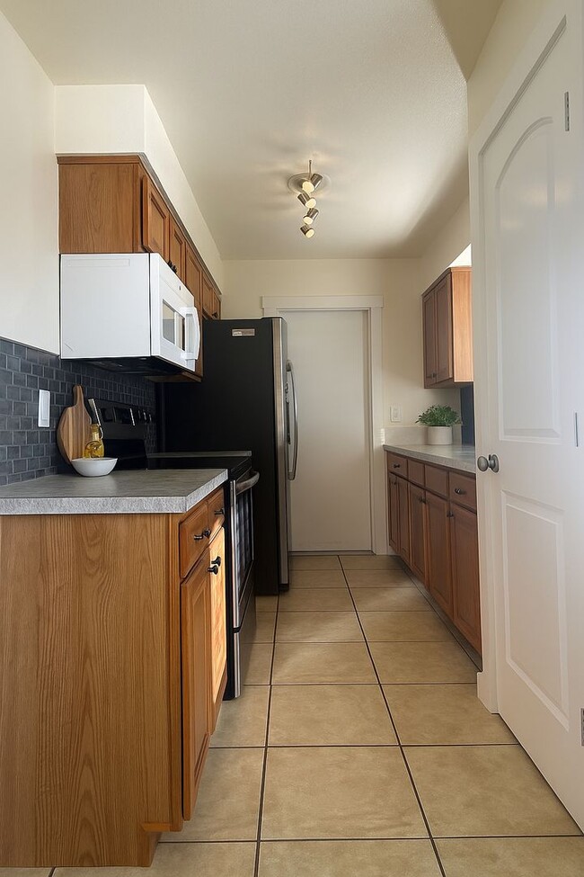 Photo - Nice 3/2 with 1 car garage fully fenced ba...