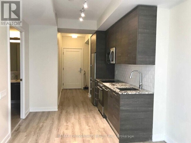 Photo - 28 Wellesley St E Unit 2006