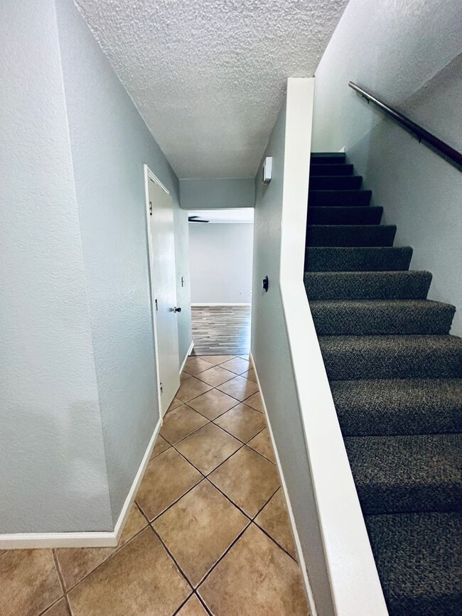 Photo - {1423} Updated Townhome + Two Car Garage + Fenced Yard + Lawncare Included