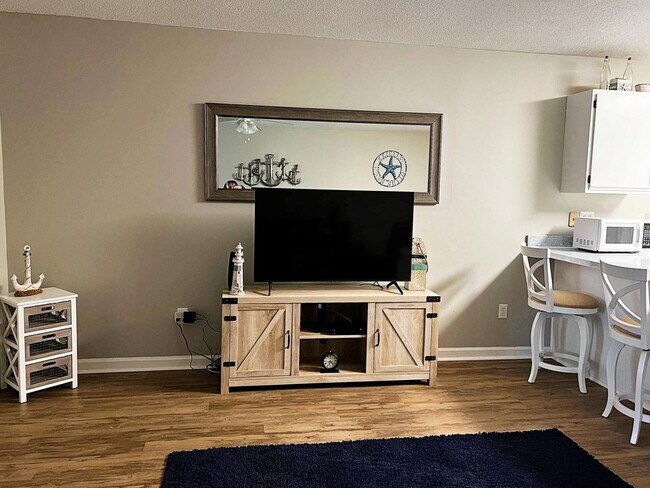 Photo - Winter rental! Recently renovated condo in quiet community with pools! Available from November 1,...