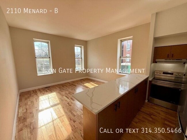 Building Photo - 2110 Menard St Unit B