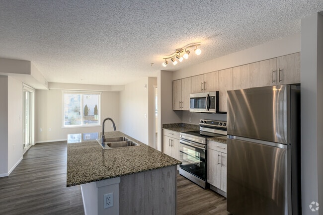 2BR, 2BA - 860SF - Kitchen / Living Room