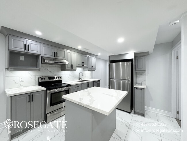 Photo - Modern 2-Bedroom Basement Apartment with H... Unit 2