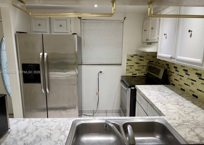 Photo - 1035 W 77th St Unit 211