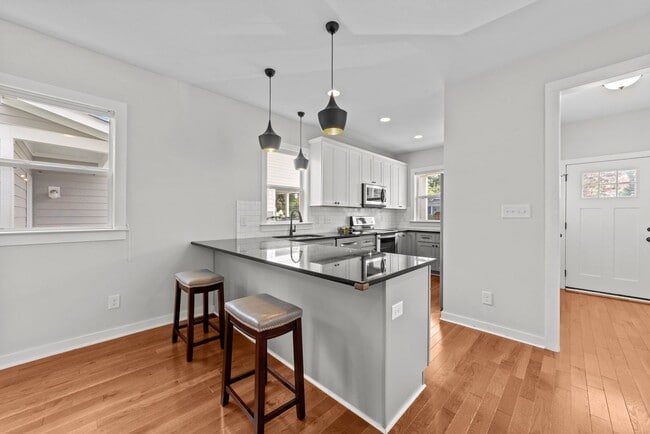 Photo - Modern 3 Bedroom home inside Downtown Raleigh, Fenced-in Backyard, Updated Kitchen, Pet Friendly!