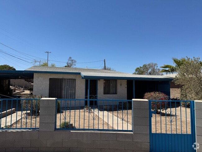 Building Photo - Three Bedroom home with Carport and Fenced...