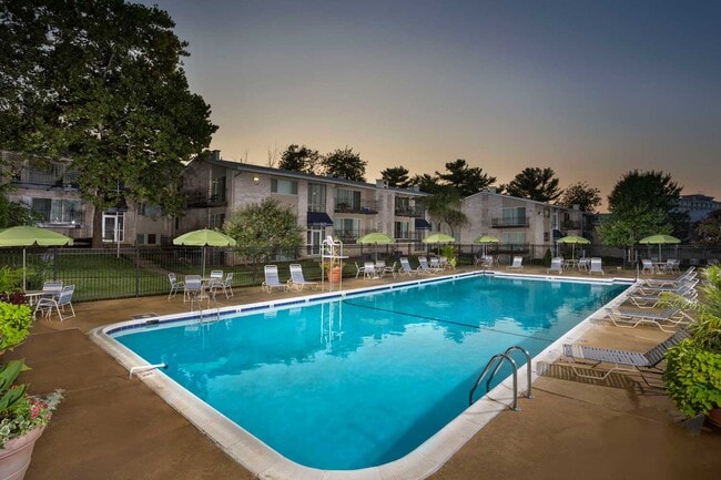 Relaxing swimming pool at Carrollon Manor Apartments in New Carrollton, MD