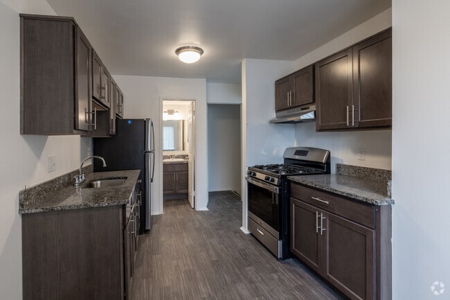 2 habitaciones, 1.5 baños - 892 pies cuadrados - Cocina - Kensington Place Townhomes