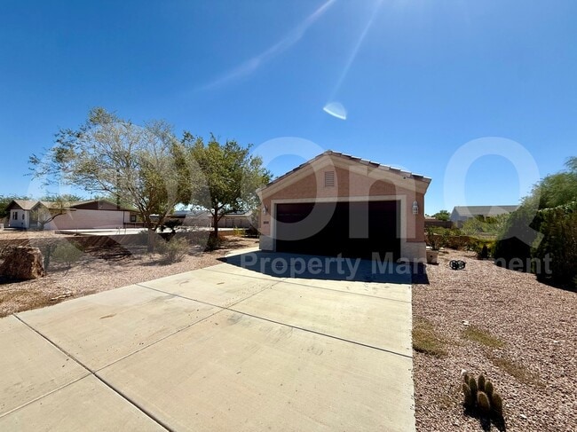 Building Photo - 10545 W Buena Vista Dr