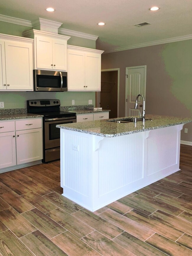 Photo - 3/2 with landscaping included!