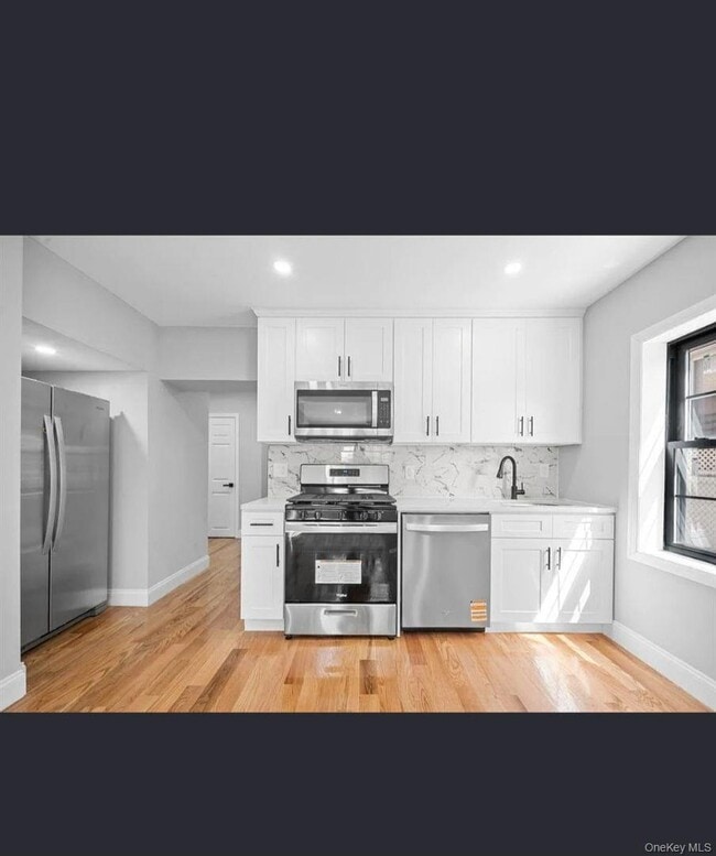 Building Photo - 23-59-59 98th St Unit 1