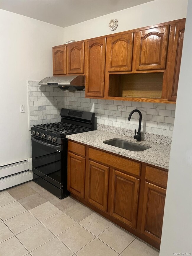 Photo - 130-28 58th Rd