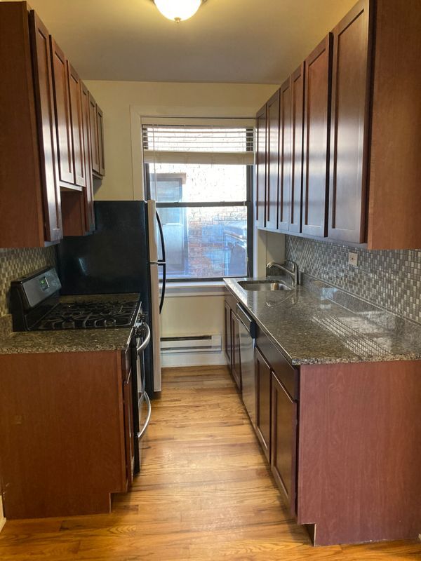 Building Photo - 1025 Dempster St Unit 1031-E1