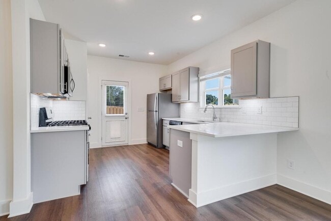 Photo - Primary Suite on main level plus Bonus Lof...