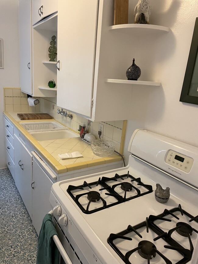 charming kitchen with gas stove