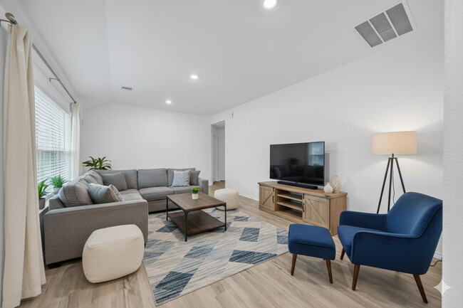 Photo - Like-new three bedroom single story home featuring a spacious open floor plan ideal for modern li...