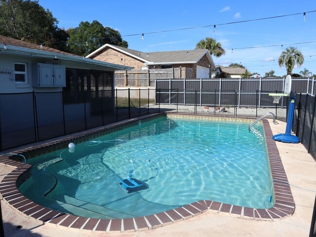 Photo - 4 BEDROOM 2 Bath Pool Home! Call Carole Arcaro 386-216-4900 Deltona Lakes Realty