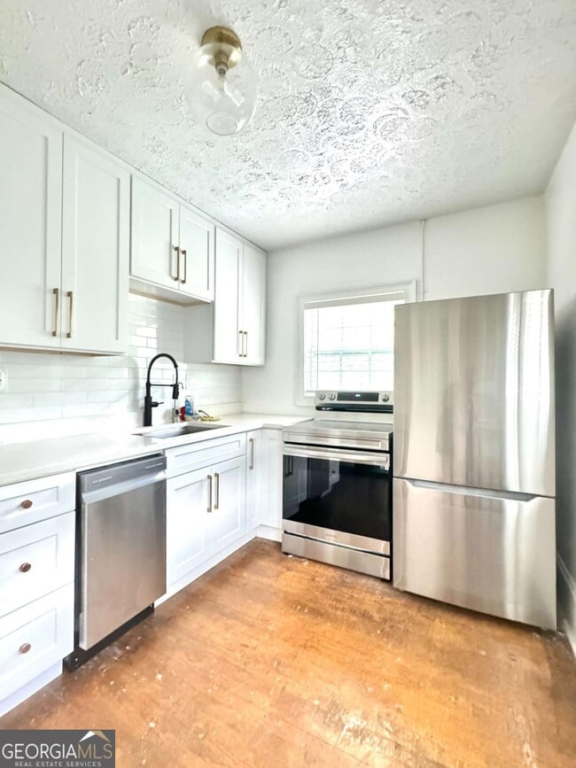 Building Photo - 52 Delmont Dr NE Unit 4 Rental
