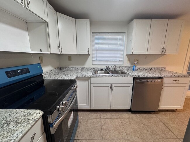 Photo - Island Charm on the North End – 5 Minutes to the Beach & Historic Downtown!