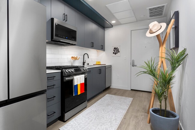 Finish Package II Kitchen with stainless steel appliances and hard-surface flooring