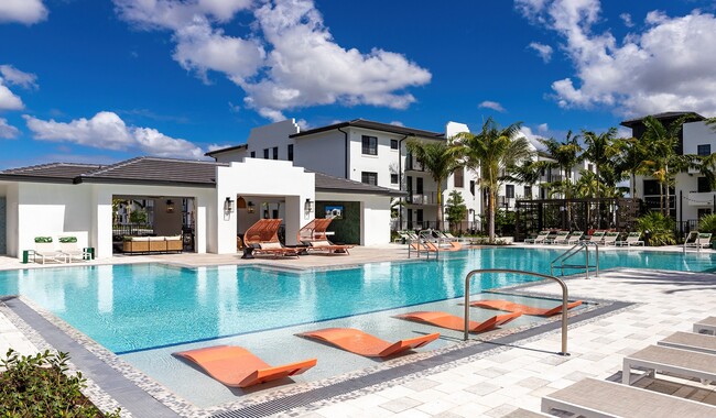 Relax by the shimmering pool at your new community - Solea at Miami Lakes Rental