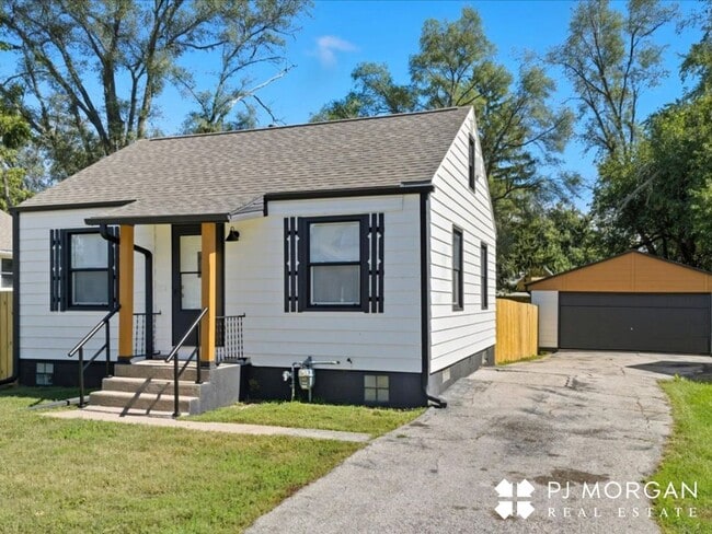 Photo - Stylish Updates + Spacious Yard + 2-Car Ga...