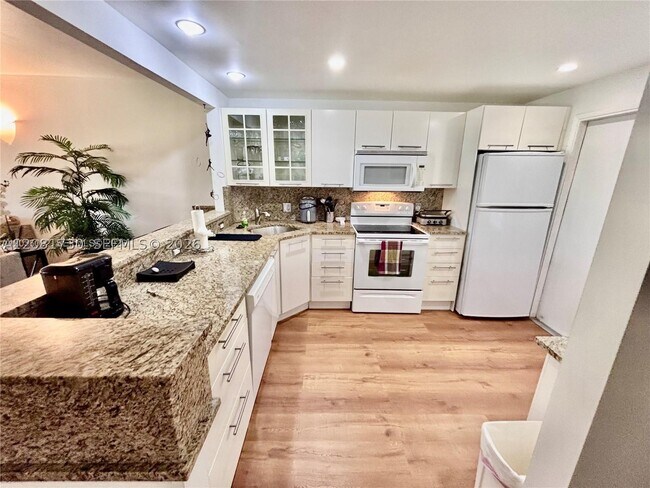 Photo - 3051 S Palm Aire Dr Unit 102