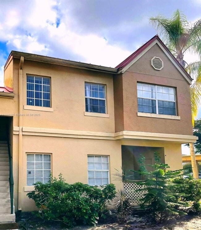 Building Photo - 18310 NW 68th Ave Unit E