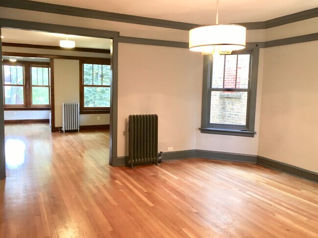 View from dining room toward living room and sun room - 2622 W Argyle St Unit Sunny 2nd Floor