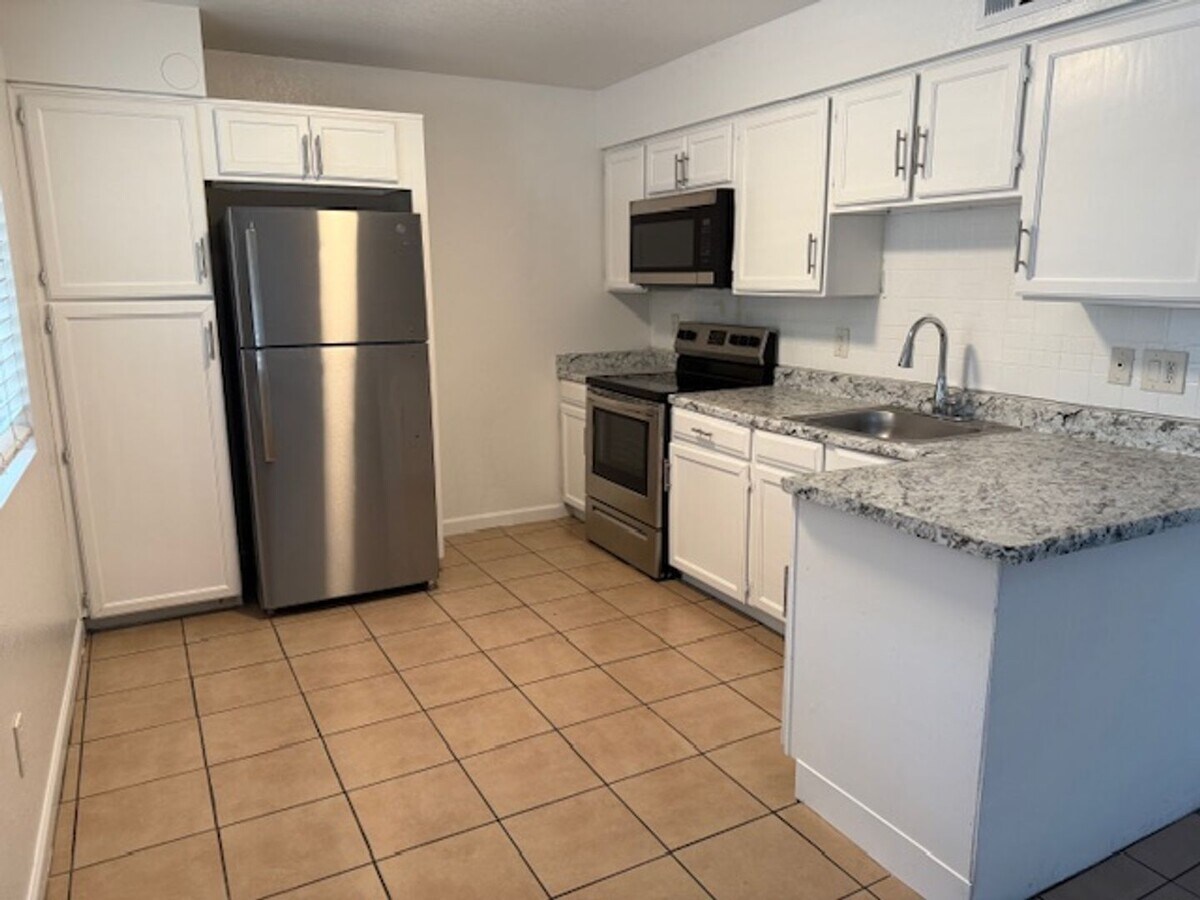 Enchanted Village - Enchanted Village Apartments