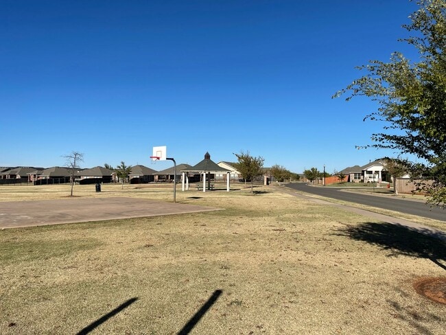 Building Photo - Neighborhood pond, playground, walking tra...