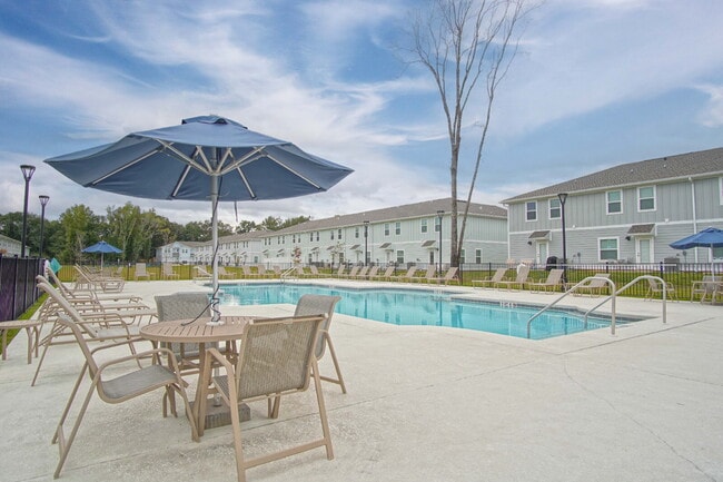 Photo - Don’t Miss This 3BR Townhome in North Pensacola — Garage, Modern Finishes, Community Pool & Easy ...