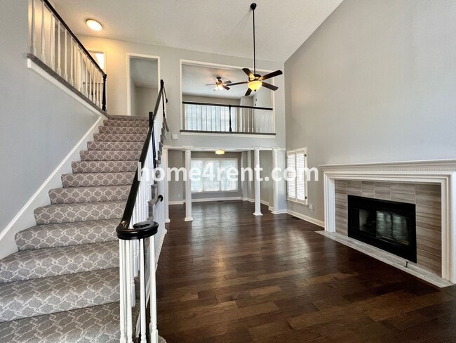 Photo - Maintenance Free Living w/ Hardwood Floors, Open Layout, Granite Counters, Finished Basement!
