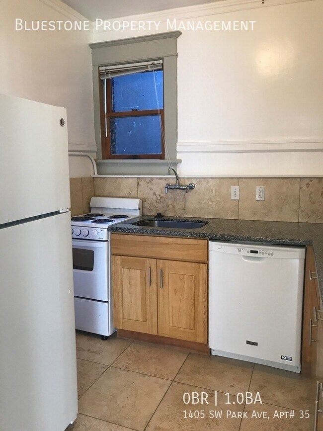 Photo - Updated Airy Studio with Bay Windows over ... Unit # 35