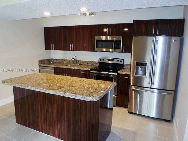 Building Photo - 4055 W McNab Rd Unit H311