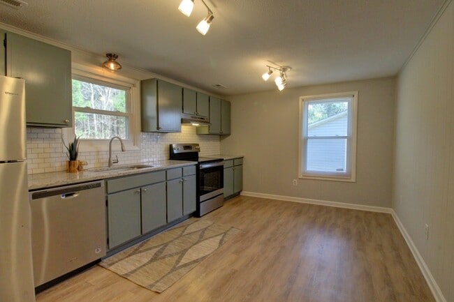 Photo - Available late August! Adorable + updated 3 bedroom home with fenced yard, 10 minutes from Downto...
