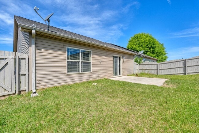Photo - Beautiful 3BR/2BA Home with Fenced Yard & Community Pool!