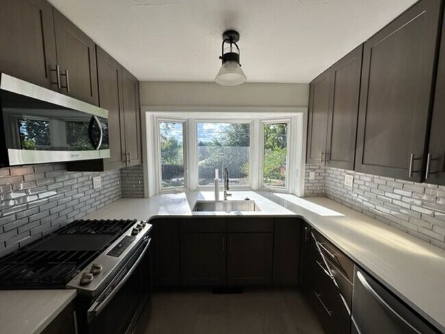 Photo - 4BR SFR w/Garage, Updated Kitchen - Deck & Yard in Englewood