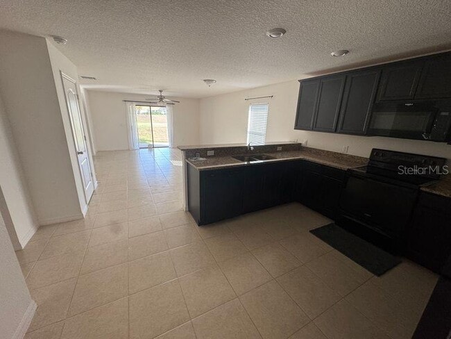 Photo - 6909 Crested Orchid Dr