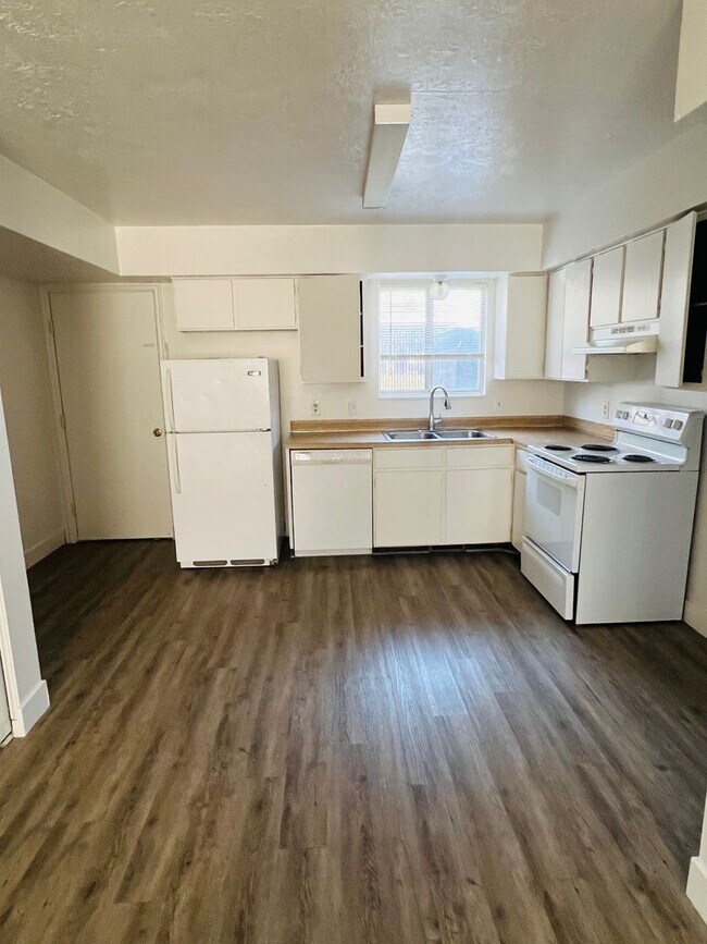 Photo - Beautiful townhome with air conditioner and carport